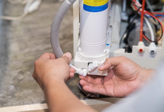 Kuala Lumpur, Malaysia - July 10, 2021 Changing water filter at home.